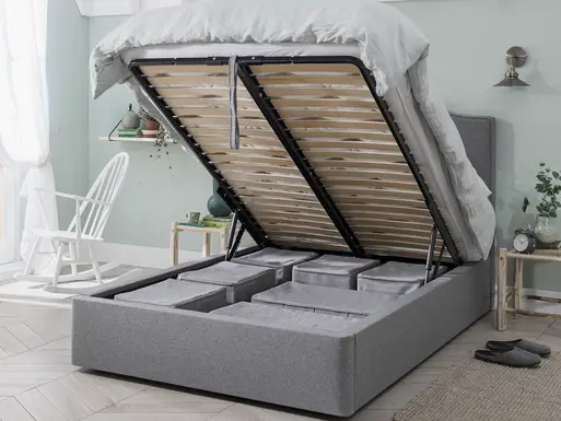 Gas strut outlet bed frame